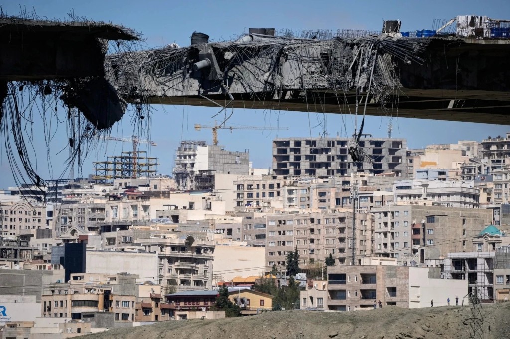 A bridge struck by U.S. airstrikes is seen in the town of Karaj, west of Tehran, Iran